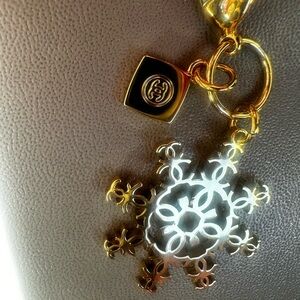 CHANEL Gold Snowflake charm